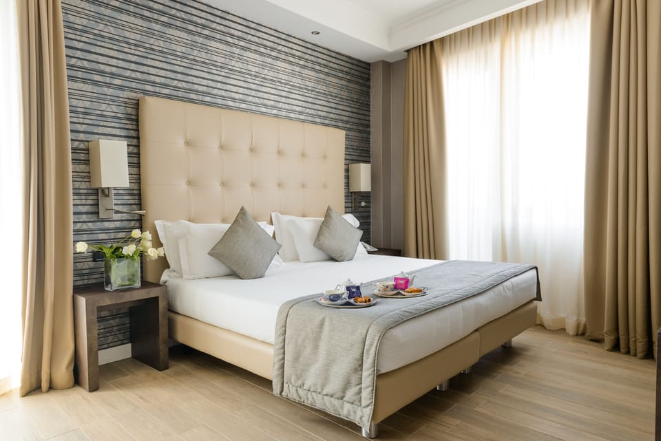 Hypo-allergenic bedding, free minibar, in-room safe, desk