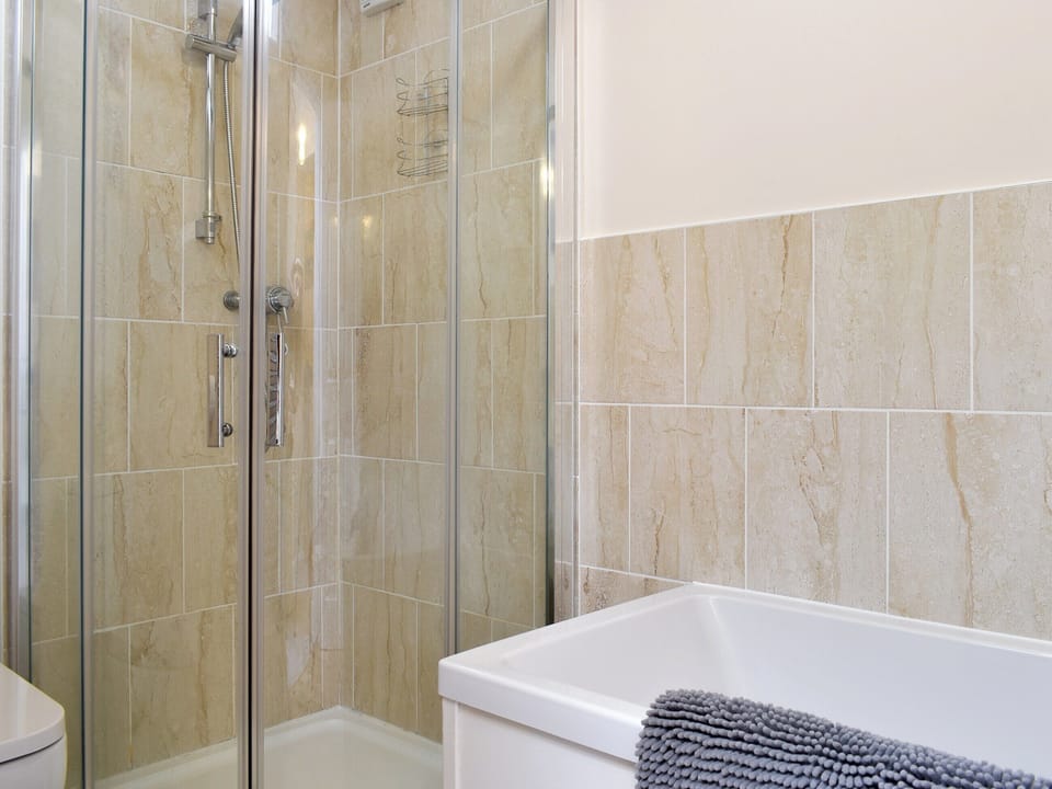 Family bathroom with bath and separate shower cubicle | Flowergate House, Whitby