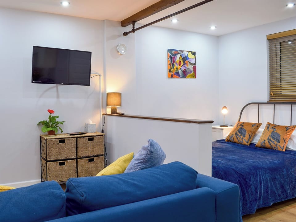Comfortable living area leading into the bedroom area | The Studio, Long Hanborough, near Witney