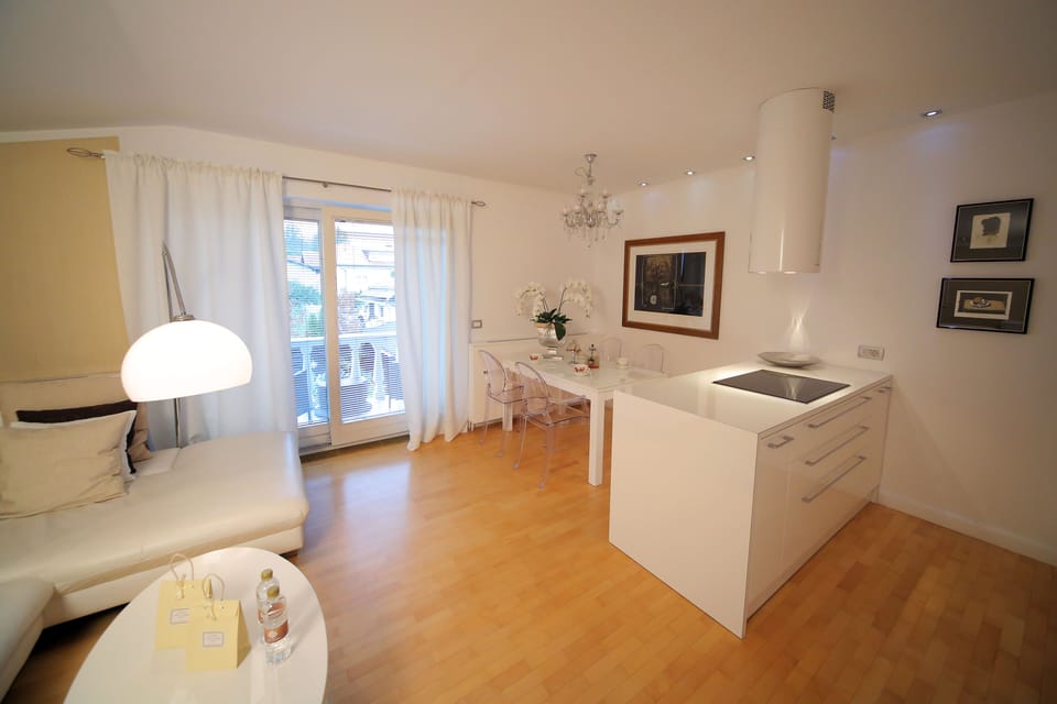 Deluxe Apartment | Living area | 80-cm LCD TV with cable channels, TV