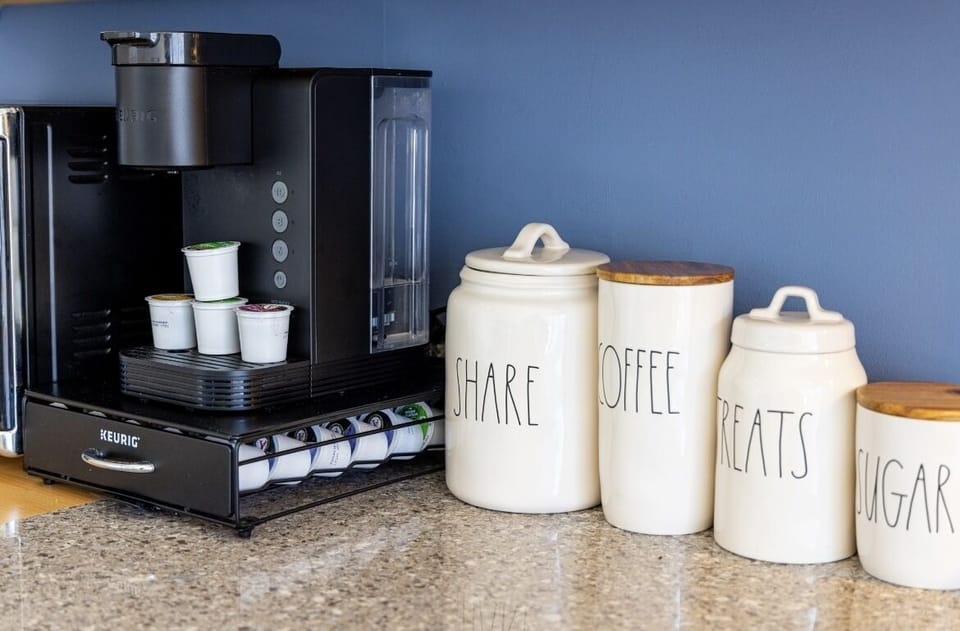 We have A Keurig on display with K cups, creamer, sugar. We also have an old fashion drip pot if desired.