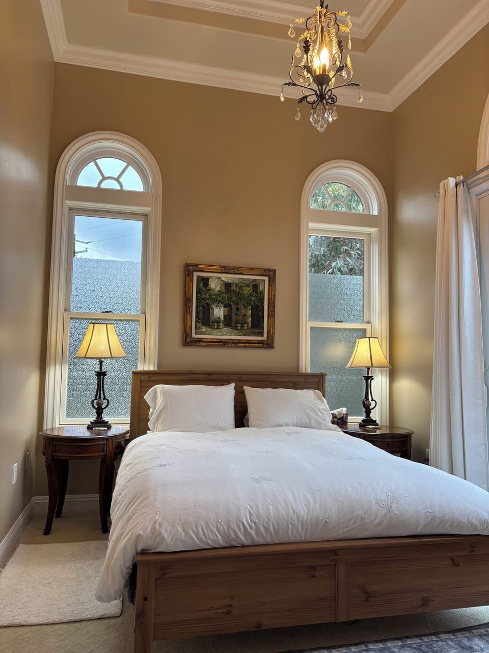 Bedroom 1 with queen sized bed.  12’ tall Celing