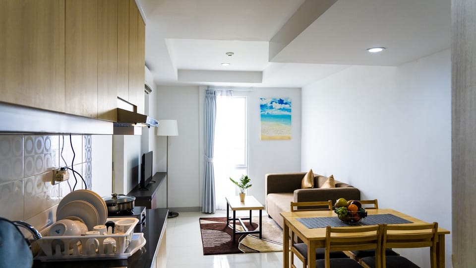Executive Room, 2 Bedrooms | Living area | 32-inch Smart TV with cable channels, TV