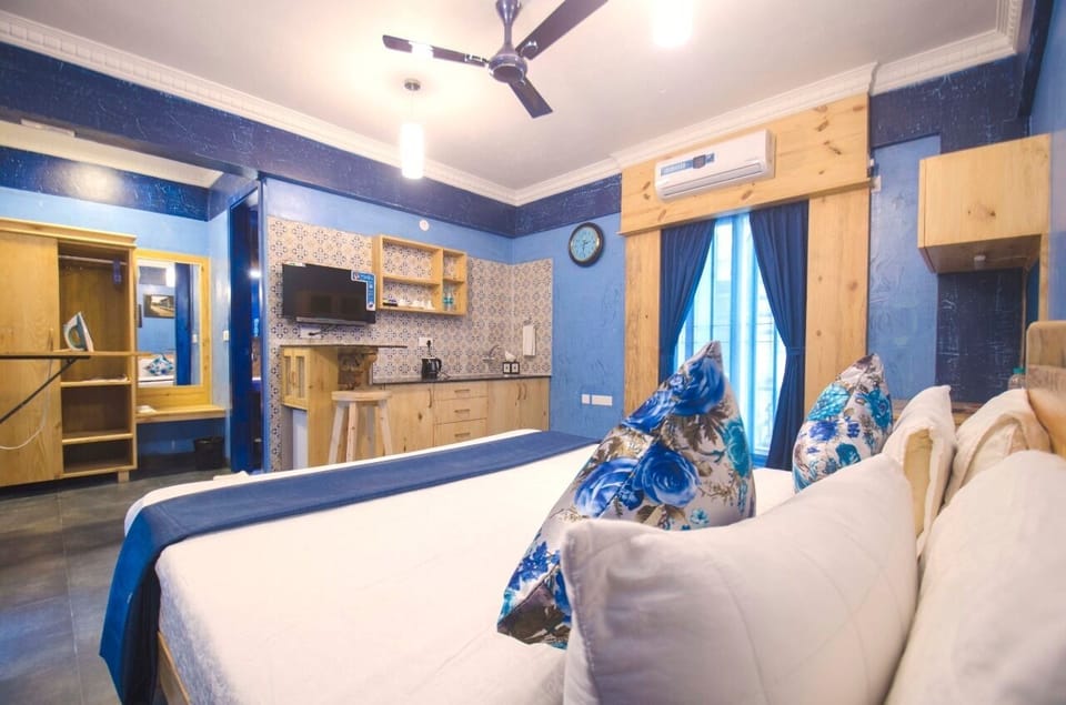 Superior Studio | Individually decorated, individually furnished, desk, laptop workspace