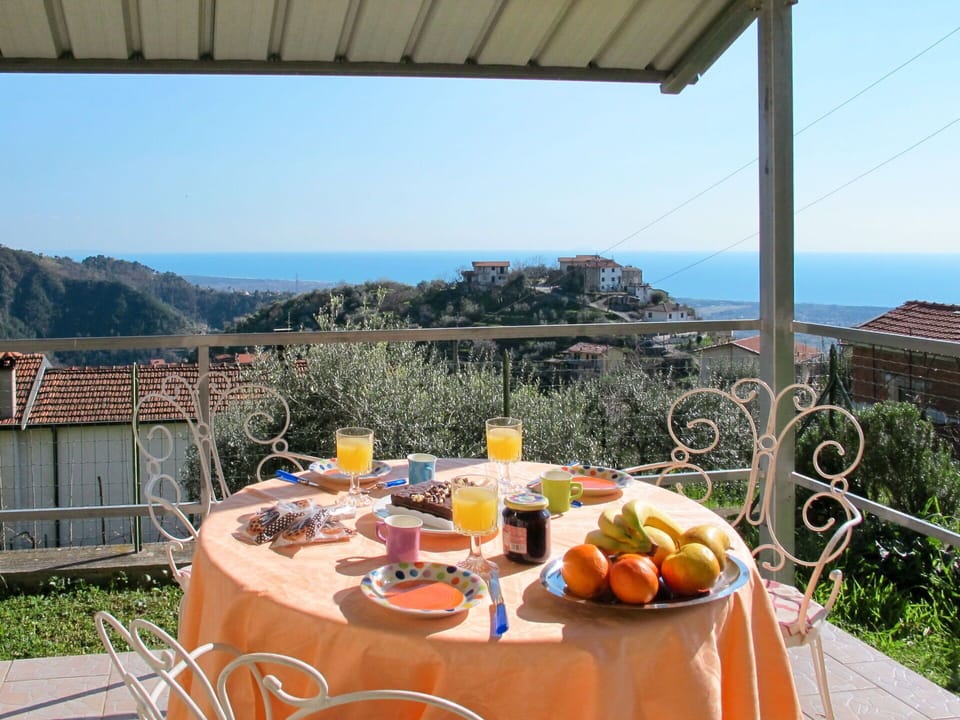 Table, Sky, Food, Furniture, Tableware, Property, Plant, Building, Chair, Azure