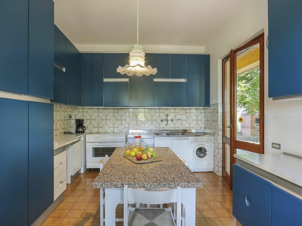 Room, Countertop, Furniture, Property, Kitchen, Interior Design, Blue, Cabinetry, Floor, Building