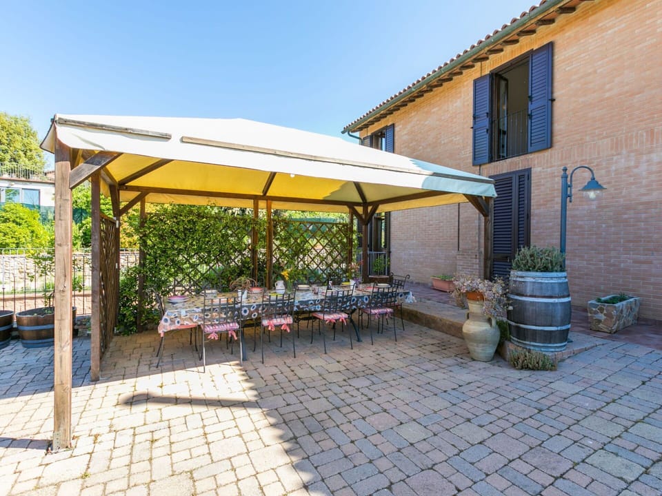 Sky, Property, Plant, Building, Flowerpot, Shade, Road Surface, Outdoor Furniture, Outdoor Table, Table