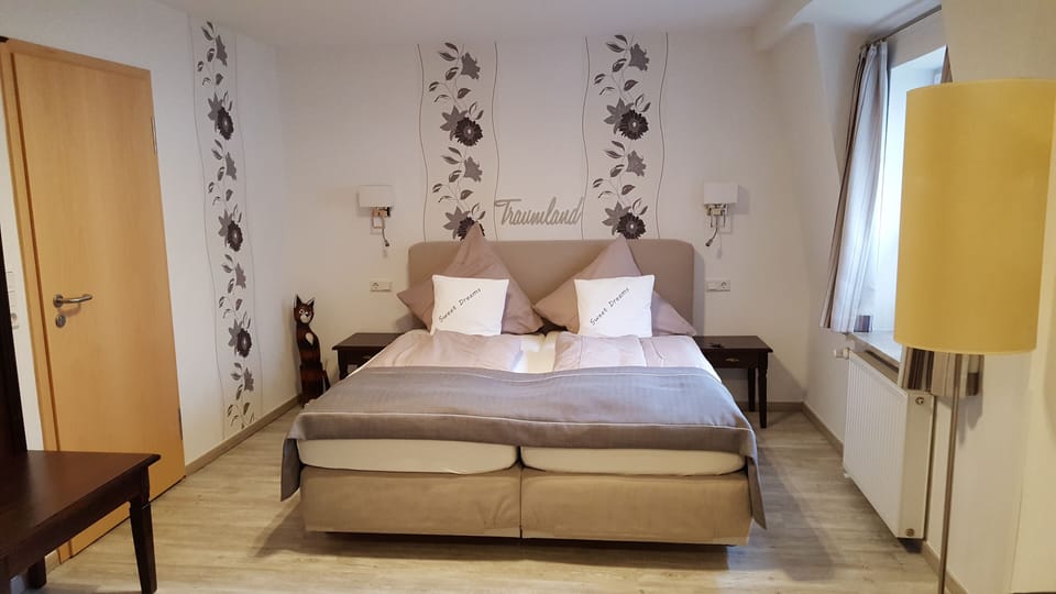 Classic Double Room | Minibar, in-room safe, individually decorated, desk