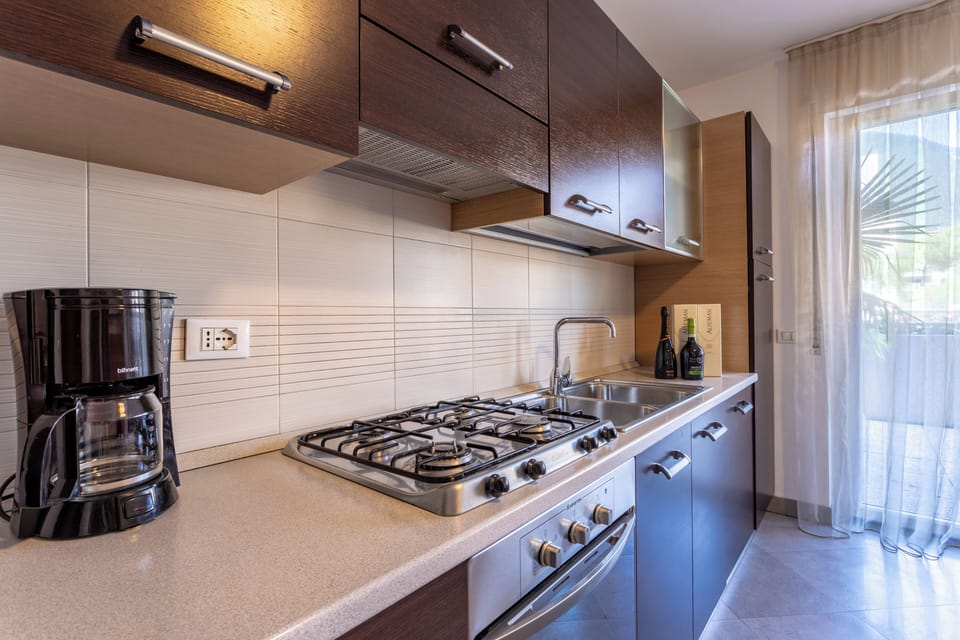 Apartment, 2 Bedrooms, Balcony, Mountain View | Private kitchen | Fridge, microwave, coffee/tea maker, highchair