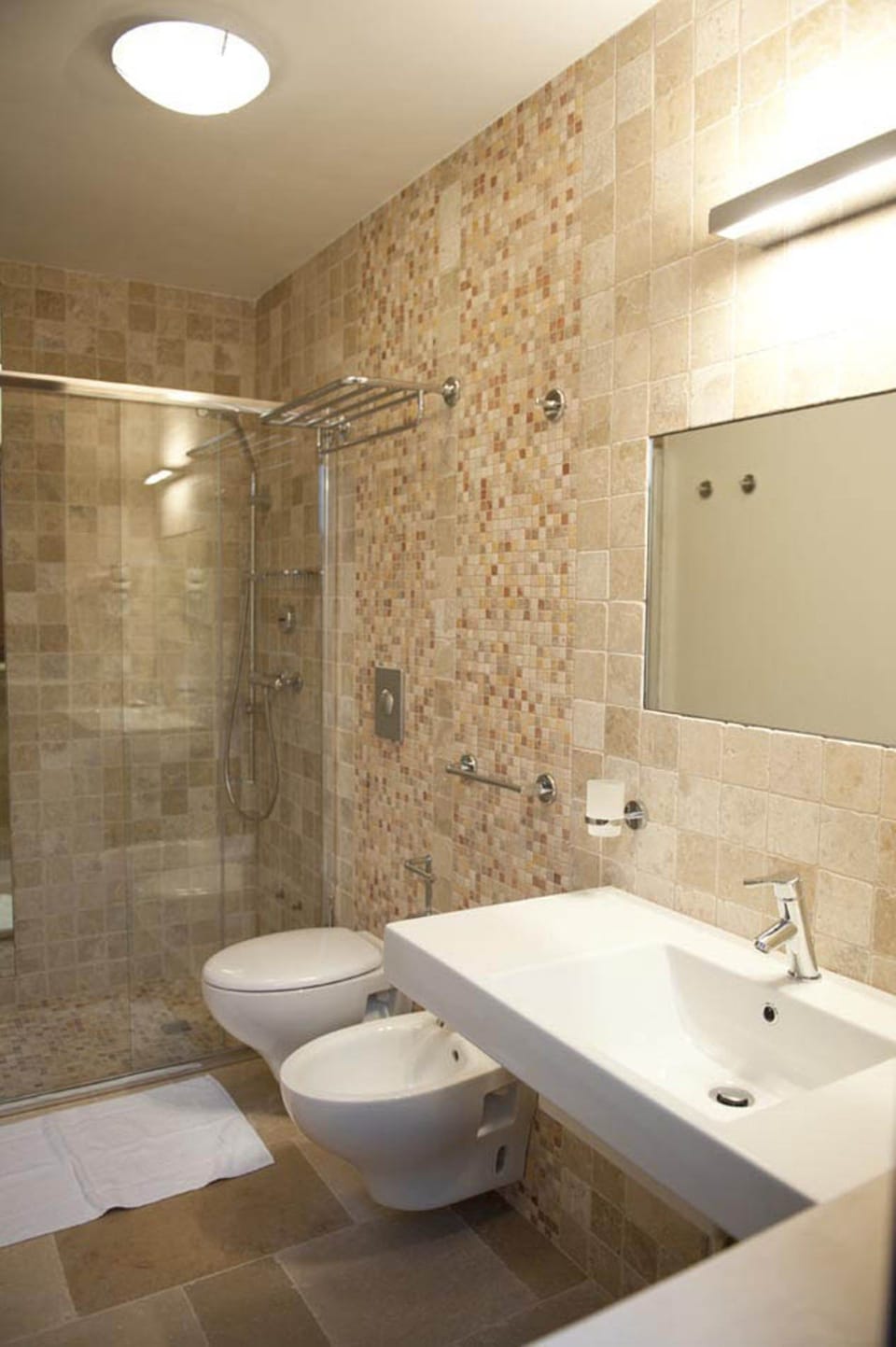 Shower, free toiletries, hair dryer, bidet