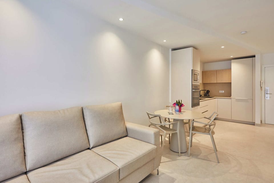 Apartment, 1 Bedroom | Living area | 32-inch flat-screen TV with digital channels, TV