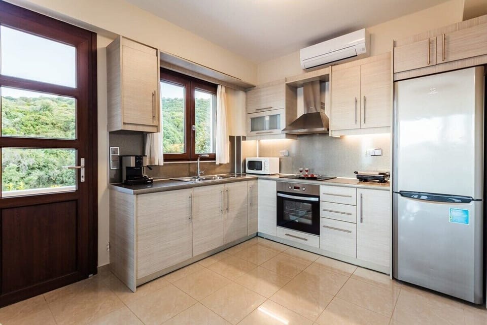 The villa offers a fully equipped kitchen, ready to inspire culinary delights