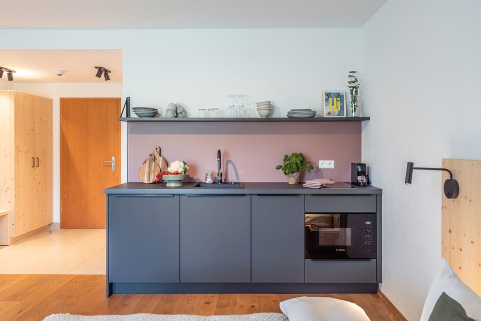 Comfort Apartment | Private kitchen | Full-size fridge, stovetop, dishwasher, espresso maker