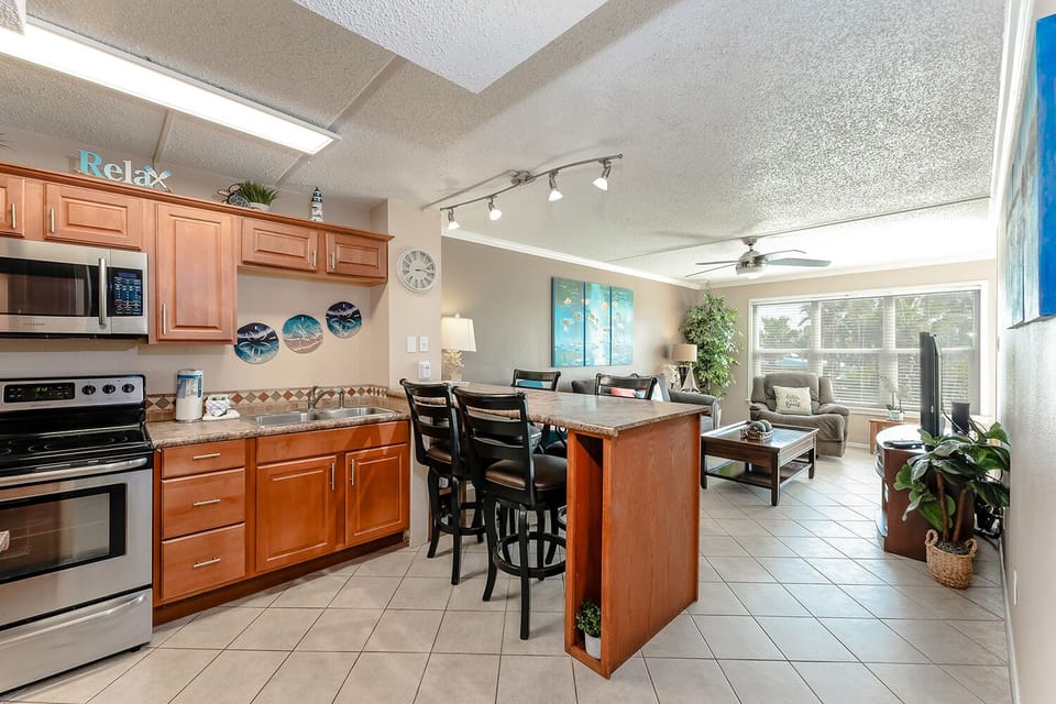 Our petite paradise packs a big punch! Everything you need is at your finger tips in our cheek-to-cheek space. Book today, and we'll get you on the beach!