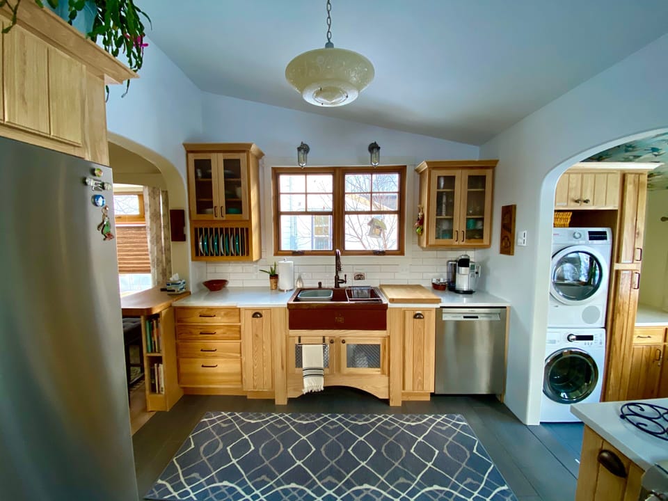 Kitchen with new stainless appliances and heated floor. 