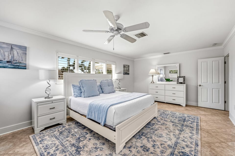 Bedroom 1 is complete with a king bed, smart TV, and dedicated workspace for added flexibility.