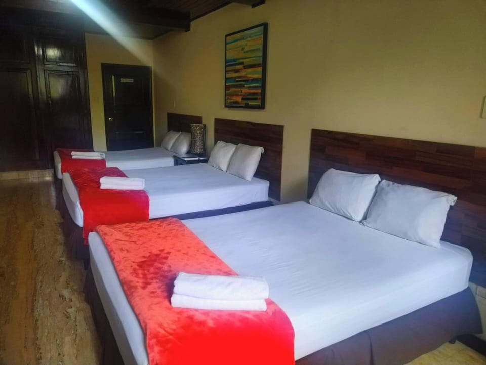 Family Room | Premium bedding, down comforters, minibar, individually decorated