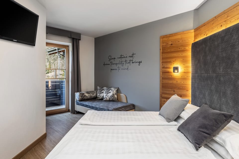 Superior Quadruple Room, 2 Bedrooms, Mountainside | Down comforters, minibar, in-room safe, desk