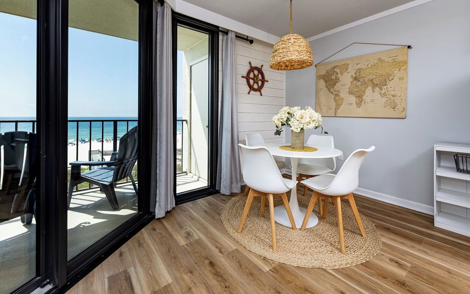 Sunlight fills the dining room as you gather around the table with loved ones overlooking the gulf coast