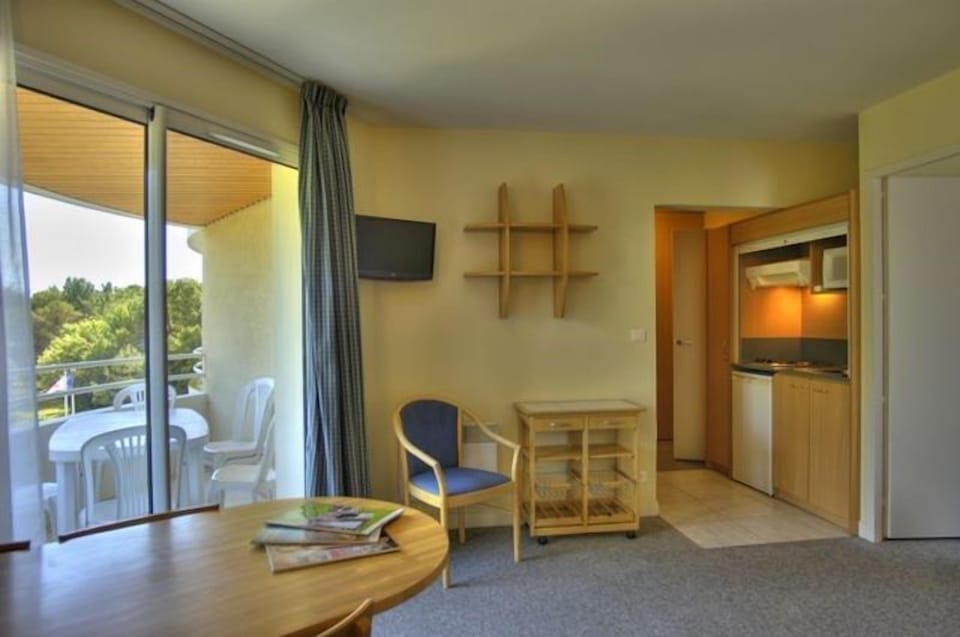 The living area is cozy, perfect for relaxing after a wonderful day.