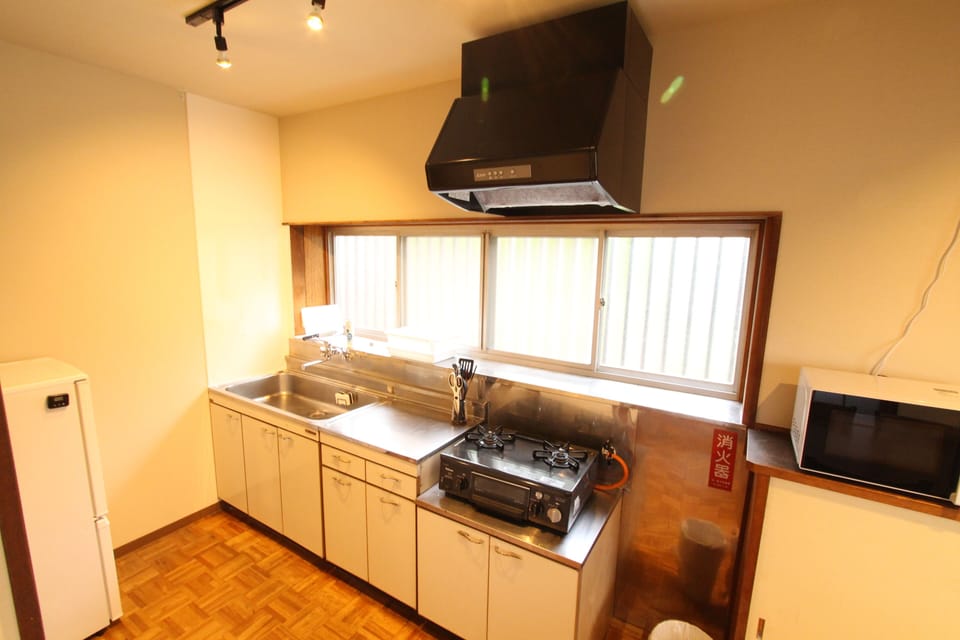 Apartment | Private kitchenette | Fridge, microwave, stovetop, coffee/tea maker