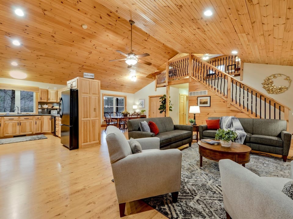 Open floor plan with cathedral ceiling