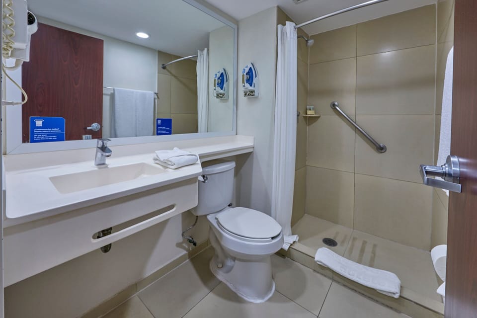 Room, 1 Queen Bed | Bathroom | Shower, hair dryer (on request), towels, soap