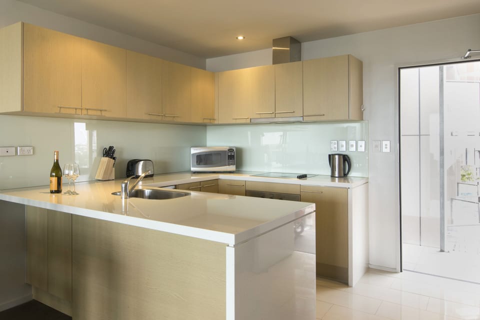 Executive Apartment, Harbor View | Private kitchen | Coffee/tea maker, electric kettle, toaster