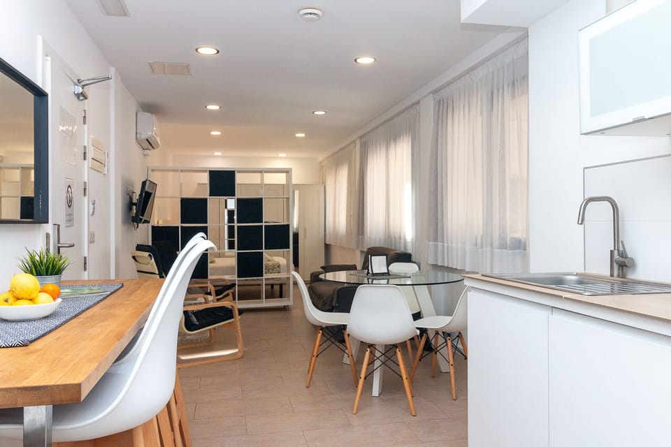 Apartment, 1 Bedroom | Living area | 32-inch flat-screen TV with satellite channels
