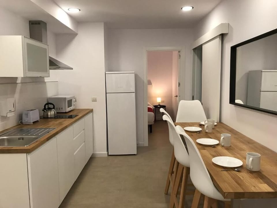 Apartment, 1 Bedroom | Down comforters, laptop workspace, blackout drapes, soundproofing
