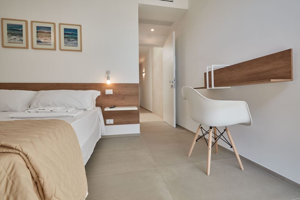 Comfort Quadruple Room | Hypo-allergenic bedding, down comforters, minibar, desk