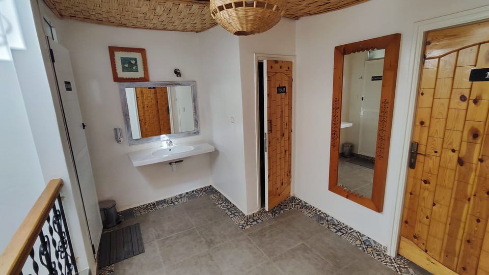 Shower, rainfall showerhead, hair dryer, towels