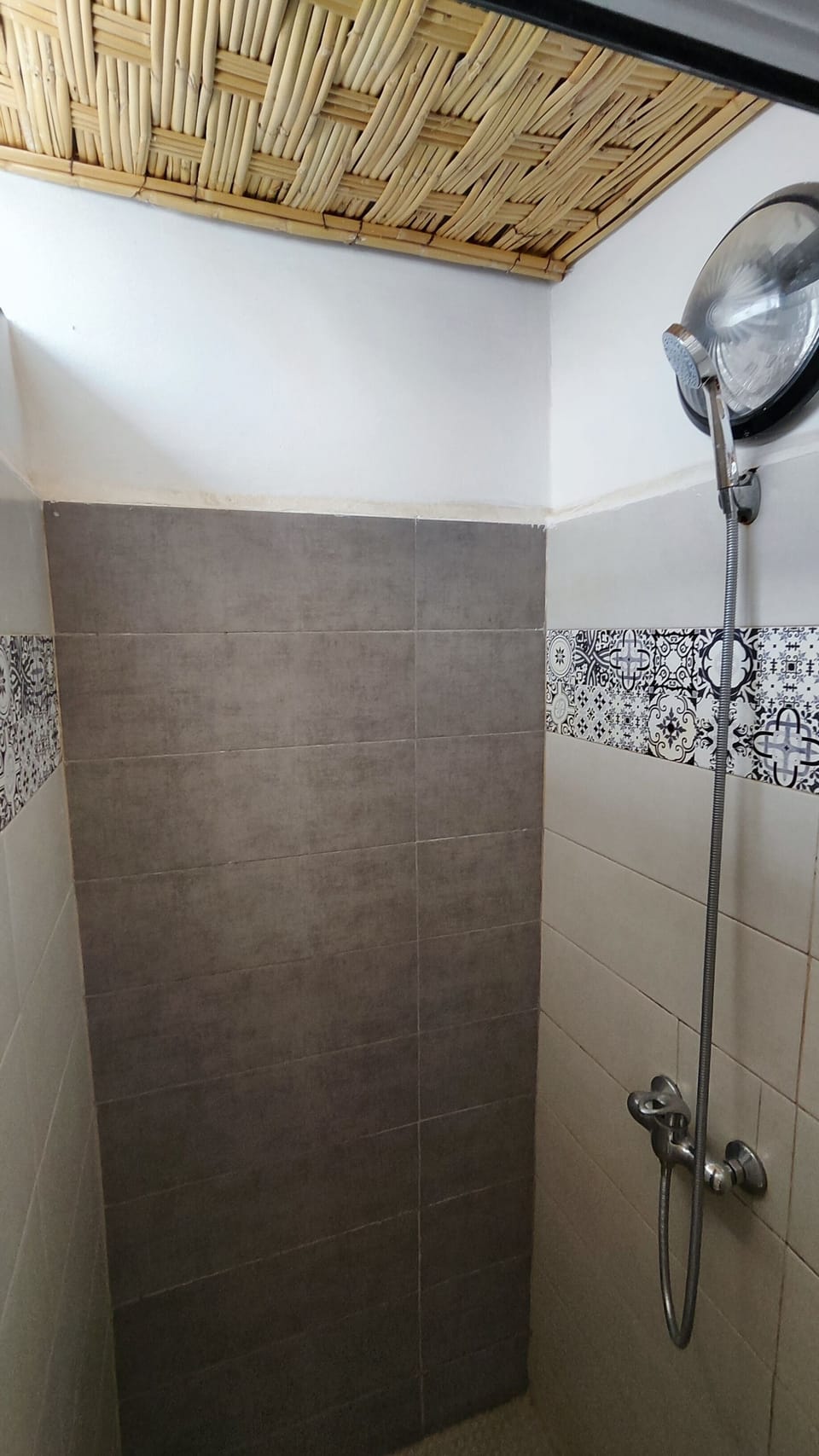 Shower, rainfall showerhead, hair dryer, towels