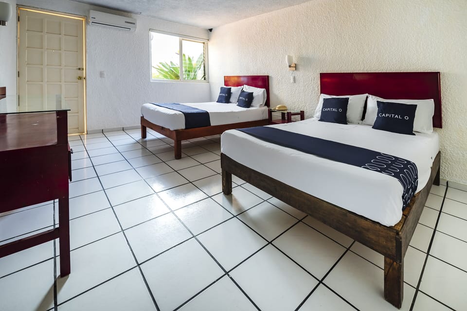 Standard Room, 2 Double Beds | Desk, soundproofing, WiFi (free), bed sheets