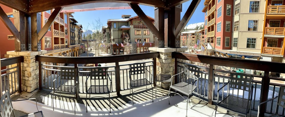 Large balcony overlooking the clock tower square. 
