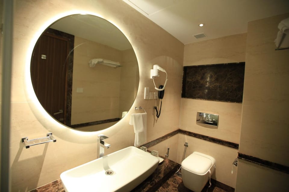 Shower, free toiletries, hair dryer, slippers