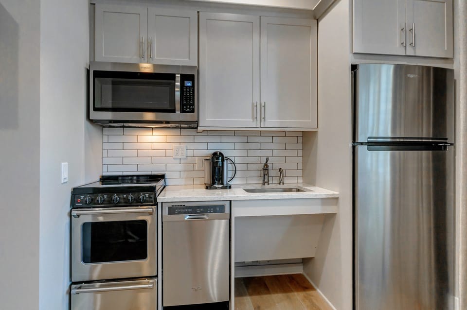 The fully-equipped kitchen features all the amenities you'd need to make a delicious meal.