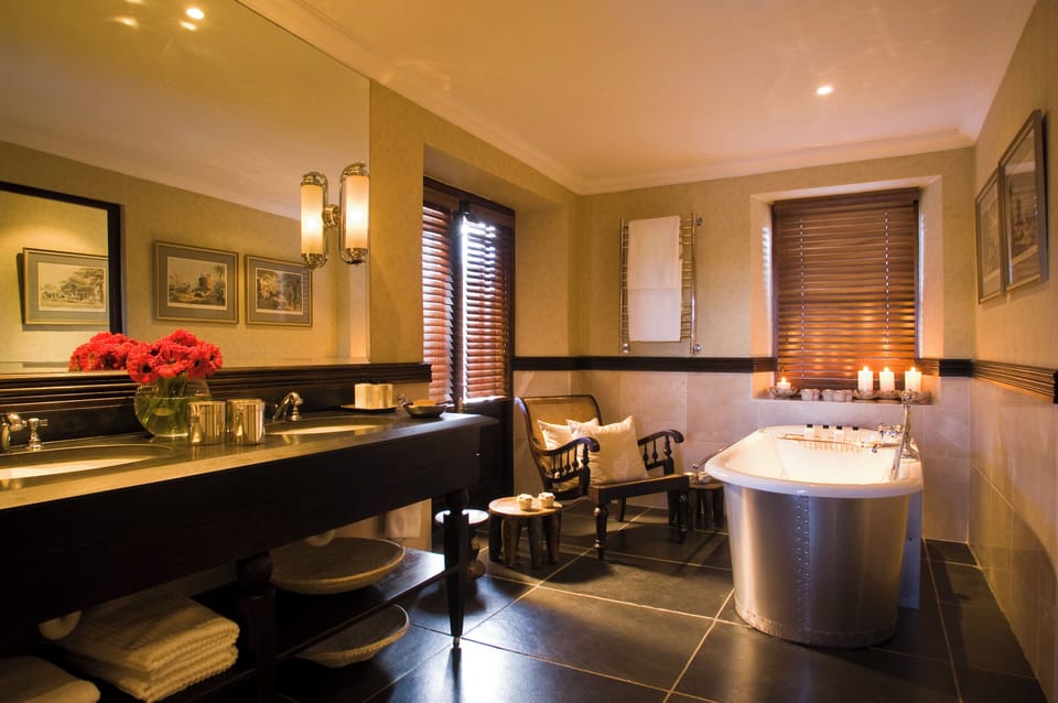 Suite (Supreme) | Bathroom | Separate tub and shower, designer toiletries, hair dryer, bathrobes