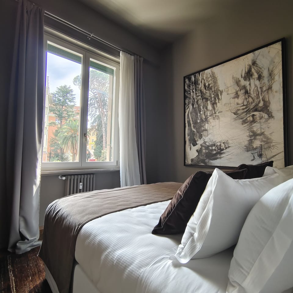 Family Quadruple Room, Connecting Rooms | Minibar, in-room safe, blackout drapes, free WiFi