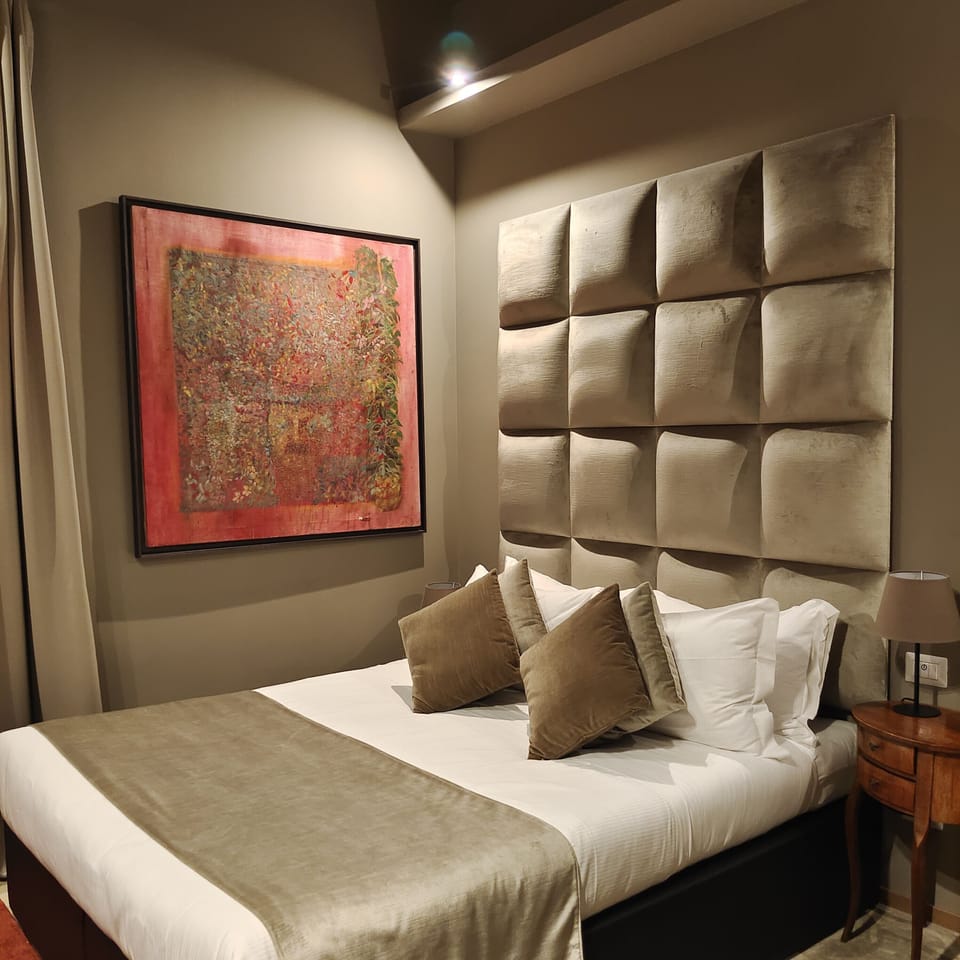 Deluxe Double Room | Minibar, in-room safe, blackout drapes, free WiFi