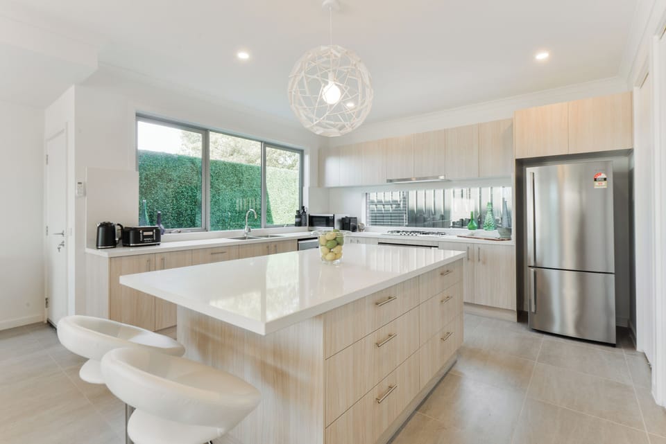 Fully equipped kitchen with dishwasher, oven, stove, fridge/freezer, microwave and coffee machine