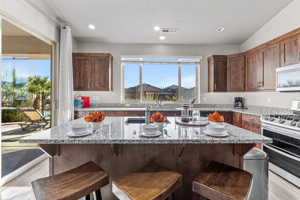 Kitchen island with 3 stools.