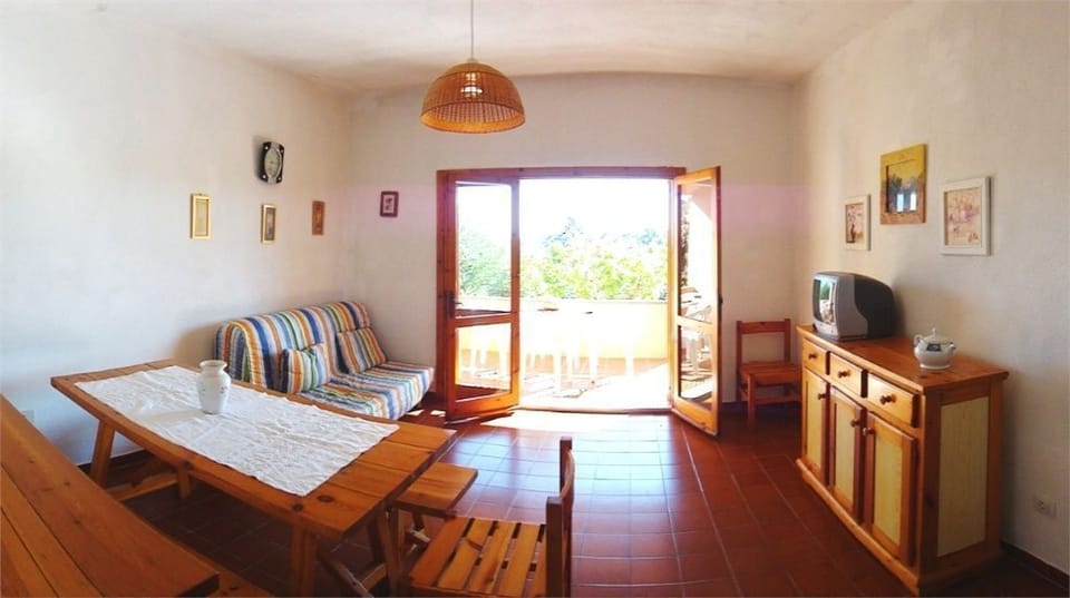Apartment, 1 Bedroom | Living area | TV