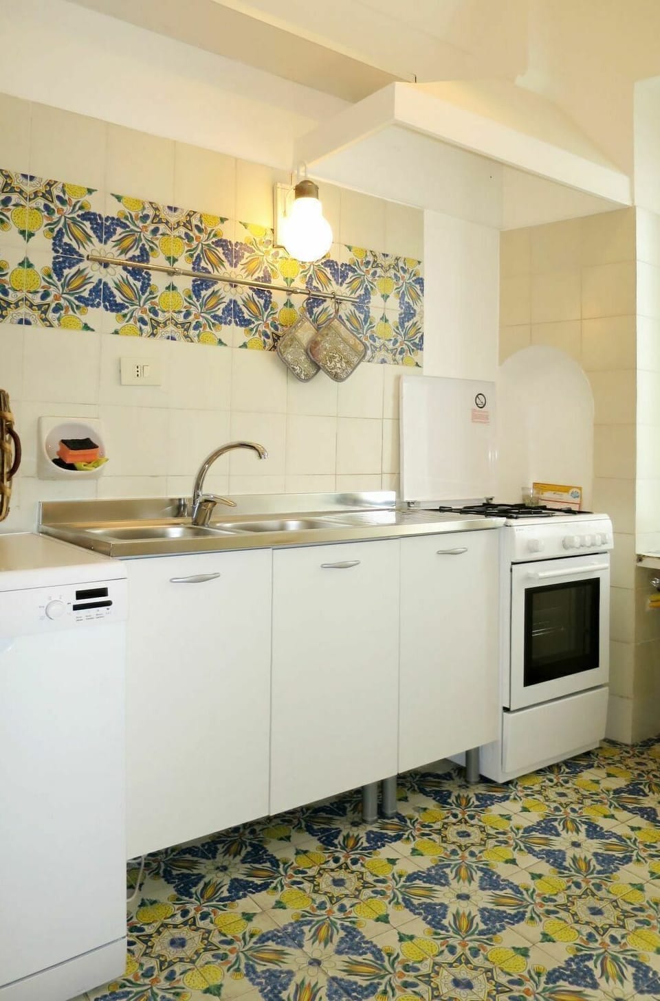 Room, Property, Kitchen, Cabinetry, Furniture, Interior Design, Tile, Floor, Yellow, Wall