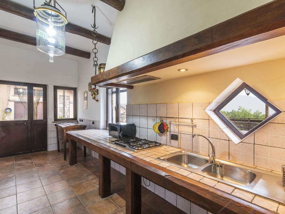 Property, Sink, Picture Frame, Countertop, Interior Design, Wood, Kitchen, Cabinetry, Houseplant, Flooring