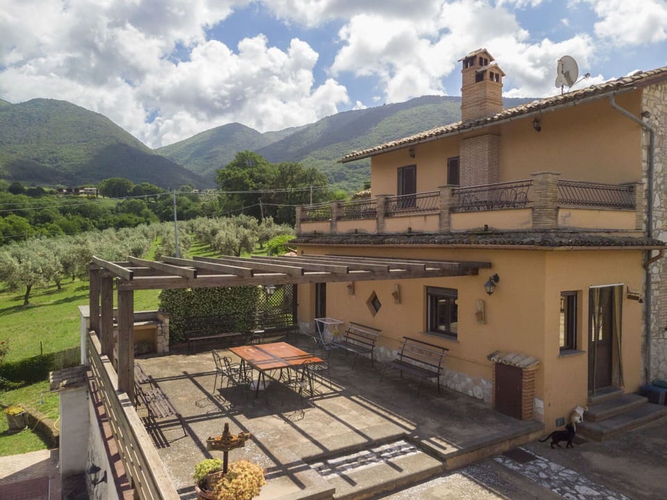 Sky, Cloud, Plant, Building, Property, Window, Mountain, House, Wood, Tree
