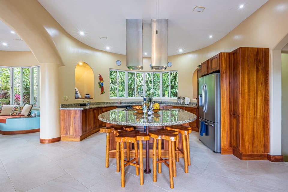 An open kitchen and dining setup that encourages shared moments