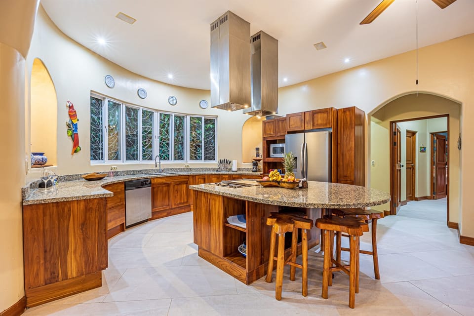 A spacious kitchen layout designed for both functionality and connection
