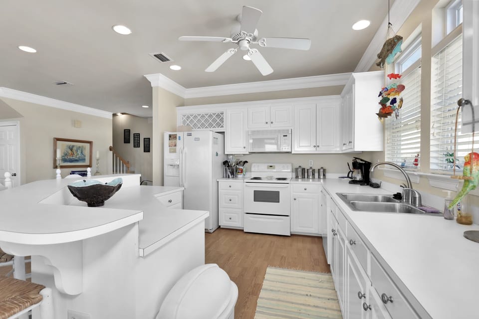 15 TraMarLis Kitchen and Island.jpg