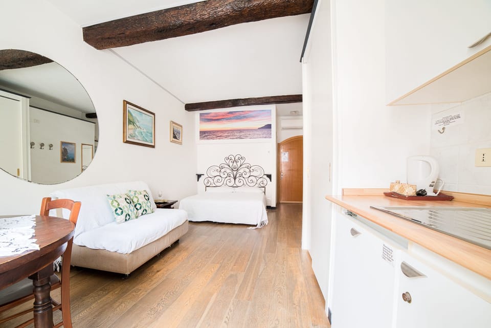 Panoramic Studio Suite, Air conditioning, Sea View | Premium bedding, down comforters, in-room safe, individually decorated